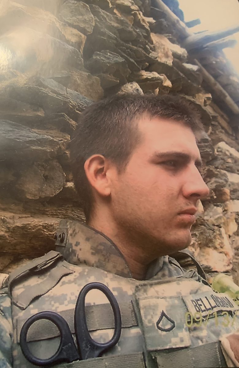 Chris Bellingham serving as a US Army combat medic